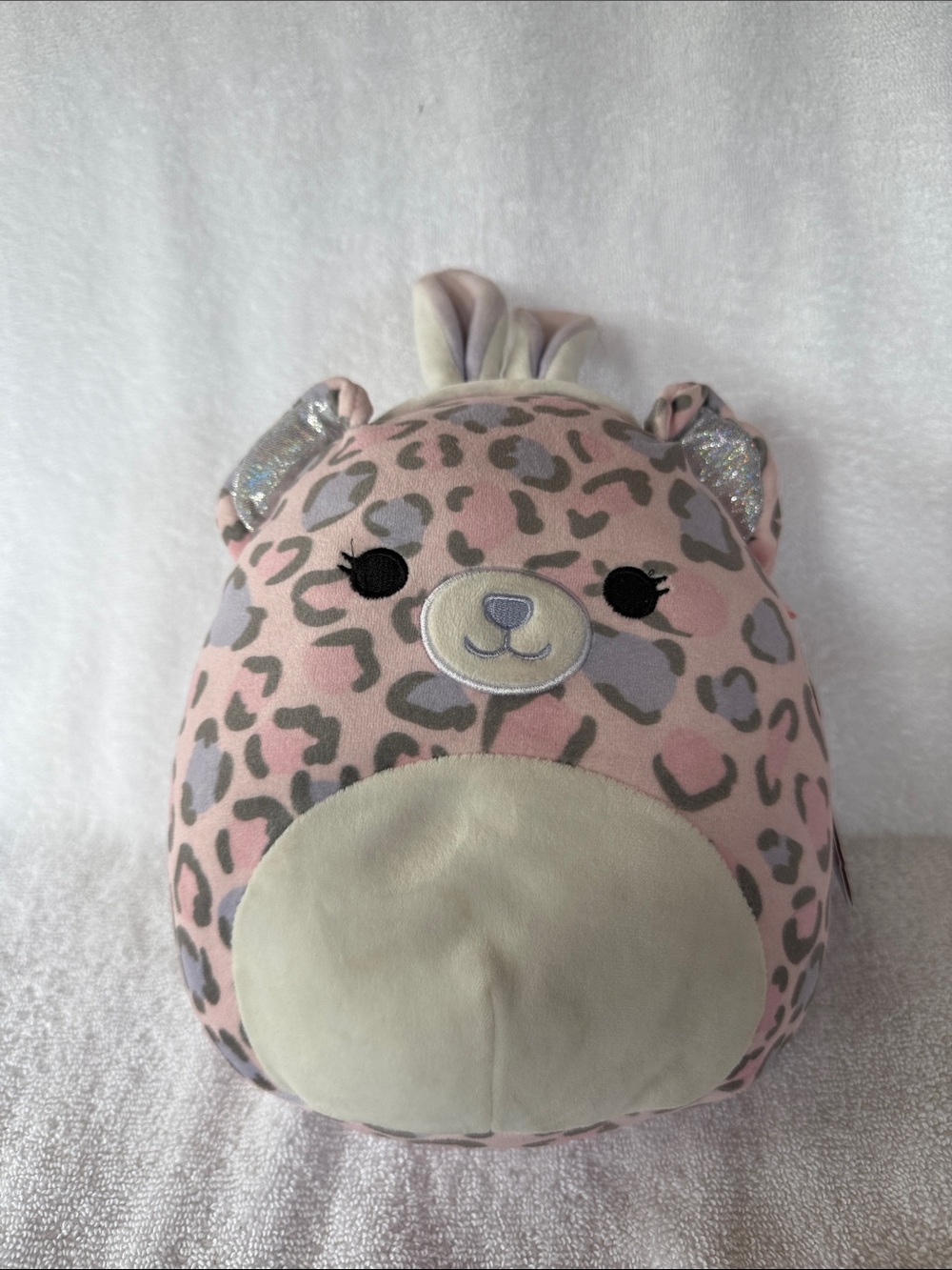 Squishmallows Dallas as a Pink Leopard Plushie with bunny ears.